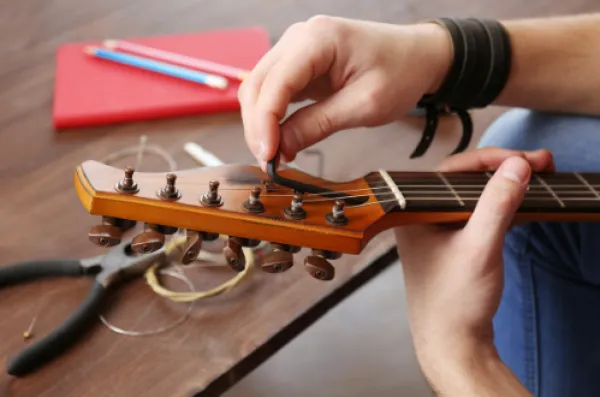 Guitar string repair near me new arrivals